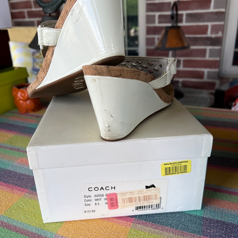 White Coach Slides.  Size 8.5. Gently worn.  Original price $120.  Sell for $25.